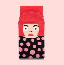 Socks designed to bear the resemblence of artist Yayoi Kusama