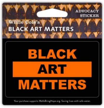 Black sticker with orange text that reads "Black Art Matters"